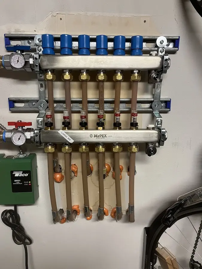 Plumber performing Water Heater Repair at a residential property in West Jordan